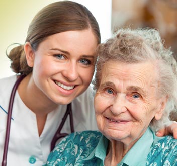 Photo of elderly person with nurse